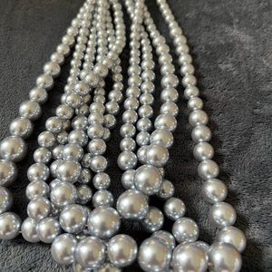 Silver string pearls